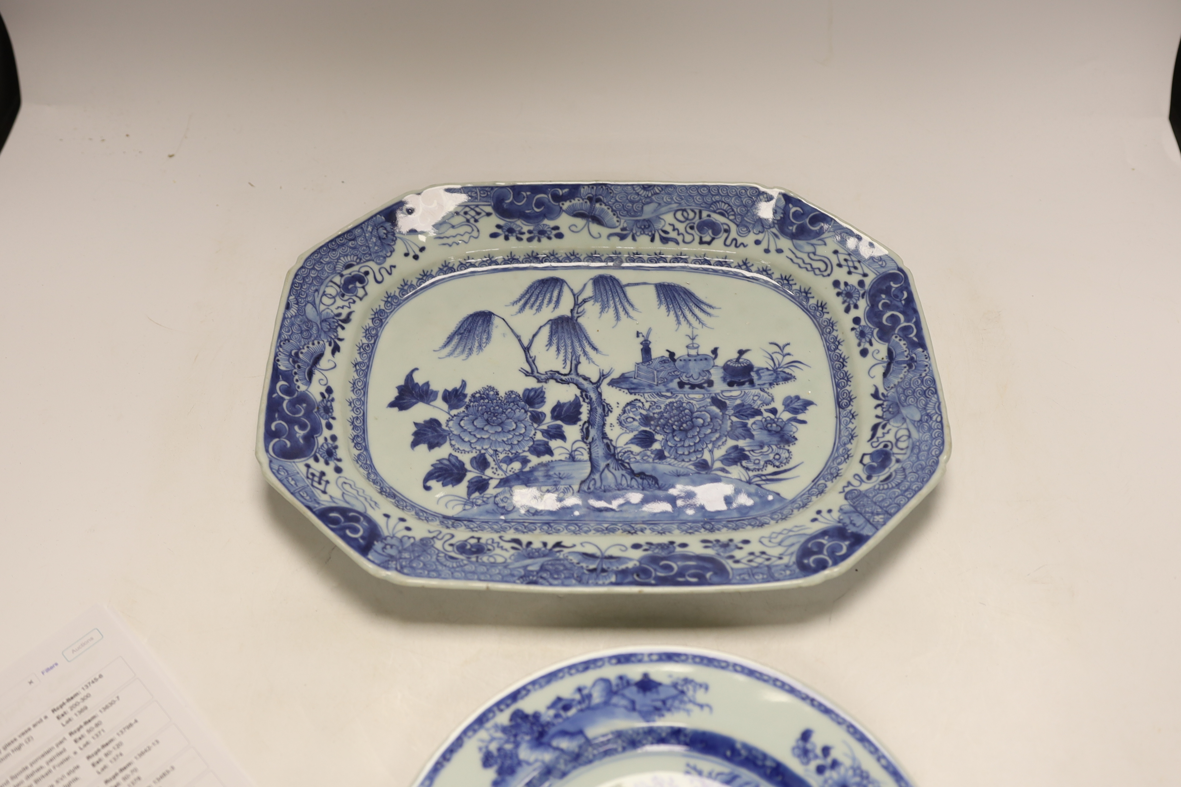 A Chinese blue and white meat plate and three plates, 18th century, meat plate 35cm wide